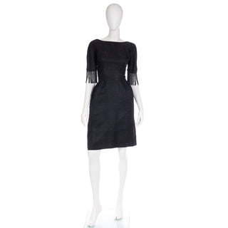 1960s textured black dress with beaded sleeves