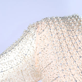 Beading, pearls and sequins on blush pink silk long sleeve dress