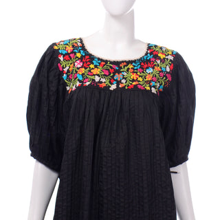 Mexican embroidered black dress with puff sleeves and top stitching