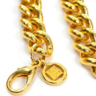 Logo on clasp of Givenchy designer gold vintage jewelry