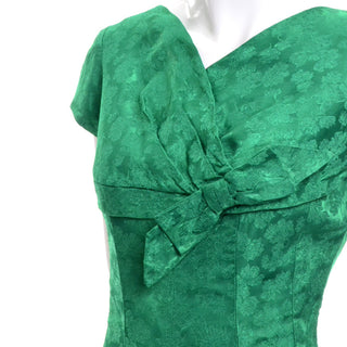 Detail of a Floral 1950's Green Satin Vintage Dress
