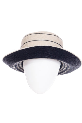 This is a wonderful vintage hat from Patricia Underwood! We love her vintage hts and love finding them in the estates we acquire. They are always beautifully made and so modern and wearable! This one is in ivory with blue stripes with the brim being solid navy blue. This hat has a 21" inner circumference and is in excellent condition!