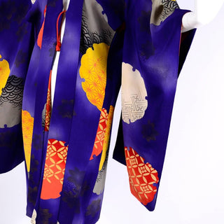 Detail of graphic style purple orange yellow Kimono silk
