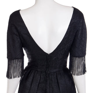 1960s textured vintage black dress with beaded fringe short sleeves