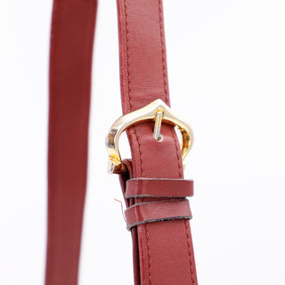 1970s Le Must de Cartier Vintage Bordeaux Leather Shoulder Bag with adjustable shoulder strap