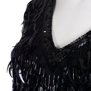 Close up of the beaded strands of fringe with long sabor tooth sequins