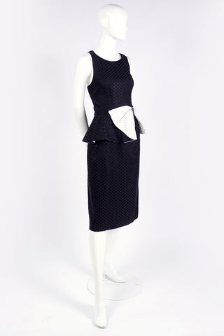 1980's sleeveless black polka dot dress with peplum