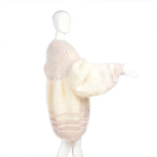 Oversized cream mohair sweater with pink details