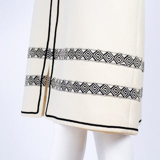 1970's skirt and vest in white crepe wool with black trim and matching belt