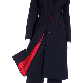 Fall Winter 1998 Alexander McQueen Pinstripe Red and Black Pantsuit with Long Coat