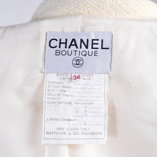 Chanel Boutique Label on a cream boucle wool blazer