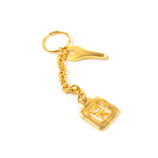 Robert Lee Morris for Donna Karan matte gold keychain