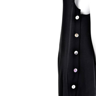 Abalone buttons down the side of a black wool vintage Issey Miyake drop crotch romper