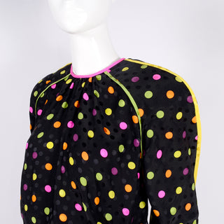Oversized black silk raglan sweatshirt with colorful polka dots