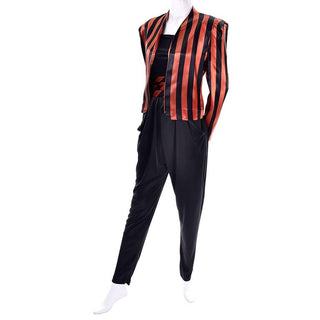 Strapless black 1970's jumpsuit with Halloween orange and black striped satin jacket and matching cummerbund