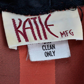 1970's vintage jumpsuit and coordinating black and orange jacket and cummerbund Katie MFG brand