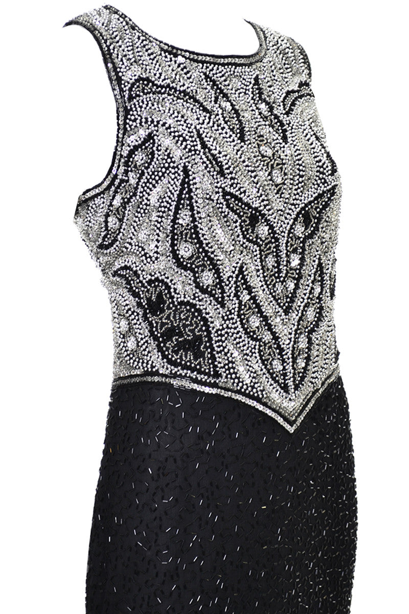 laurence kazar beaded dress Today I found this vintage Laurence Kazar dress at goodwill. I have absolutely no where to wear this to, but I couldn't pass it up!