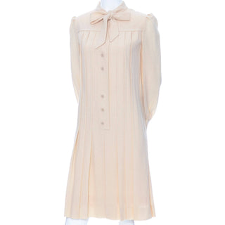 1970s Pleated Cream Wool Shift Dress with Bow by Marshall Field - Dressing Vintage