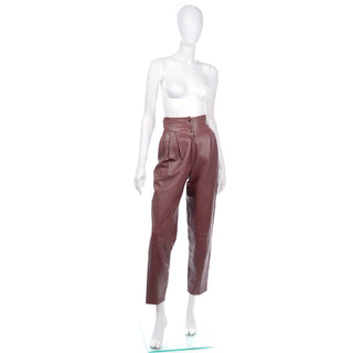 High waisted vintage leather pants in a dark rose pink
