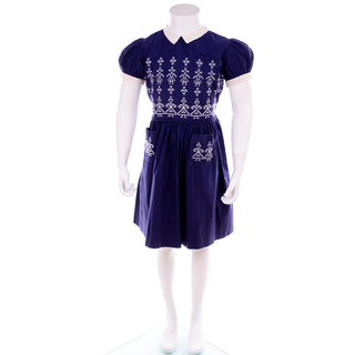 1950s Child's Blue Cotton Dress With Cross Stitch figures