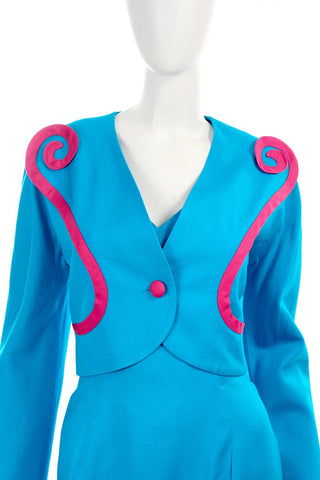 Cropped blue linen bolero jacket with pink swirls