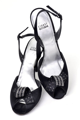 Stuart Weitzman black satin heels with rhinestone bows