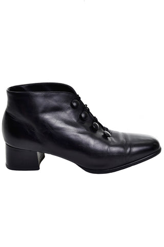 Short black leather boots with heel