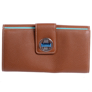 Tiffanys brown leather wallet with turn lock closure