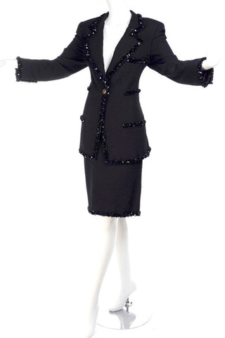 1990's Ungaro black skirt suit with beaded trim and long blazer