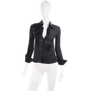 Black sheer fitted blouse by Valentino with floral appliques