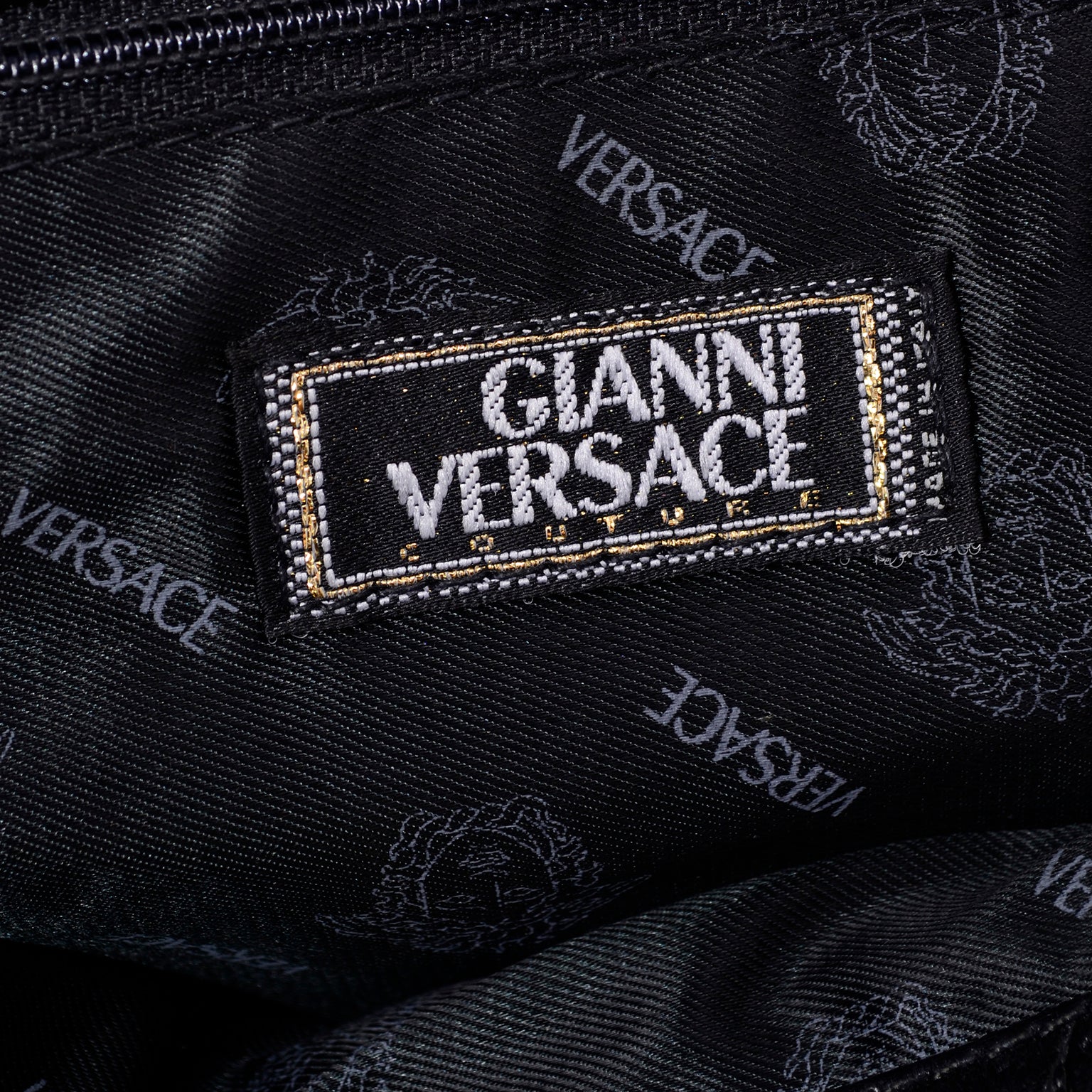 Leather handbag designed by the great Gianni Versace in … | Drouot.com