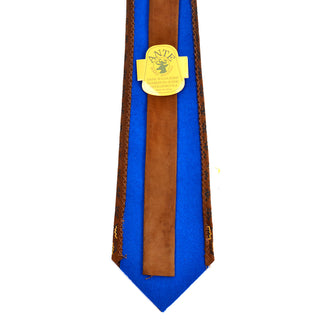 Blue, yellow and brown suede vintage necktie from the 1970's with cutouts on the front