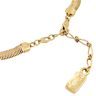 Yves Saint Laurent Gold Pendant With Gold Tone Clasp