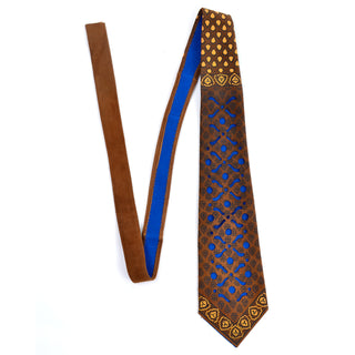 Vintage 1970's necktie made in Spain with cutout suede and blue lining