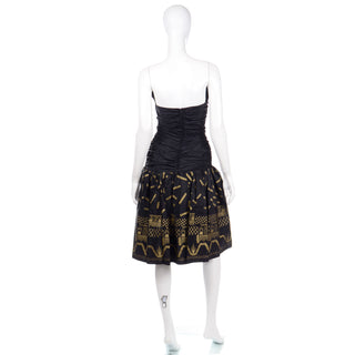 1980s Zandra Rhodes Black Strapless Evening Dress w Gold Stencil Design and Drop Waist
