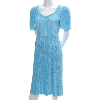 Blue pleated day dress by Mary McFadden couture
