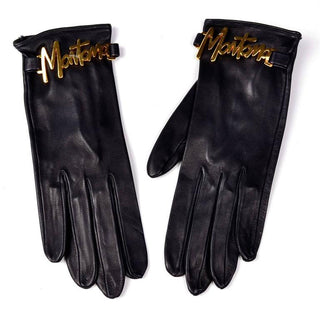 Black leather Claude Montana vintage gloves with gold tone lettering