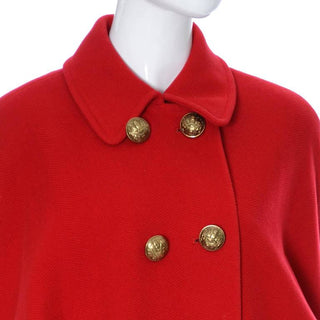 Large brass buttons on red wool vintage coat