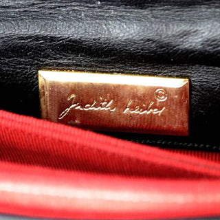 Judith Leiber black patent handbag with six brass animals