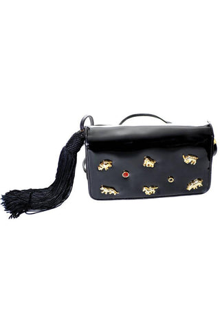 Judith Leiber patent leather bag with tassel and animals