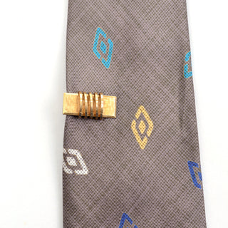 Krementz 14k gold plated art deco set of cuff links and tie bar