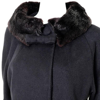 Black wool Lilli Ann vintage swing coat from the 1960's with fur cuffs and collar