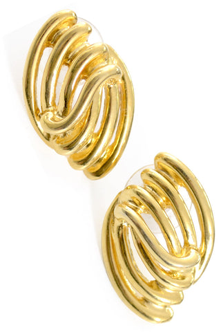 Vintage Monet gold tone pierced earrings open swirl - Dressing Vintage