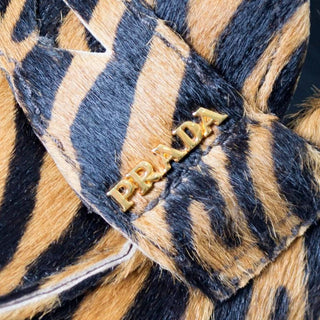 Prada zebra print pony fur loafers 7.5 with gold logo