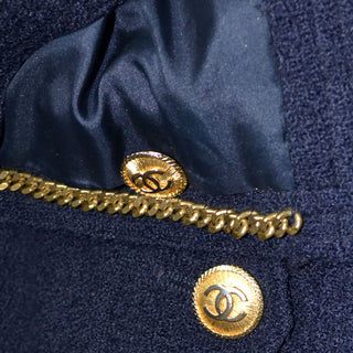 1970s or 1980s Navy Blue Wool Vintage Chanel Boutique Skirt Suit with Chain and Logo Buttons